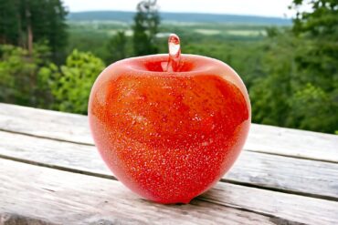 Glass red apple outside