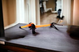 Miniature glass orange dachshund